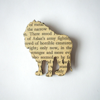 Illustration for article titled Brooches Made From Classic Books Let You Wear Your Favorite Words